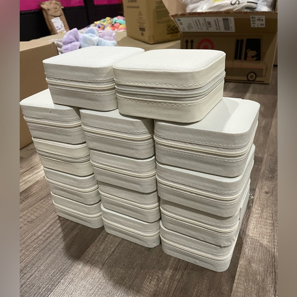 White travel jewelry cases